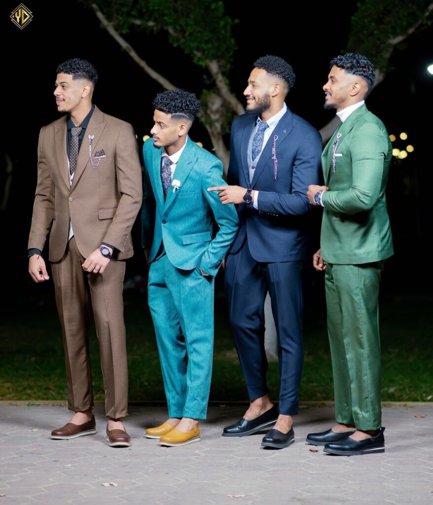 photo by hepta on november 22, 2025. may be an image of standing, suit, bowtie, dinner jacket, blazer and outdoors.